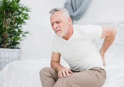 elder men with lower back pain